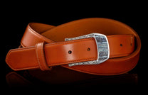 Handcrafted designer belt buckle from William Henry in solid sterling silver inlayed with blue Woolly Mammoth Tooth.  Each inlay is hand-polished from a slice of the molar tooth of the Wooly Mammoth.