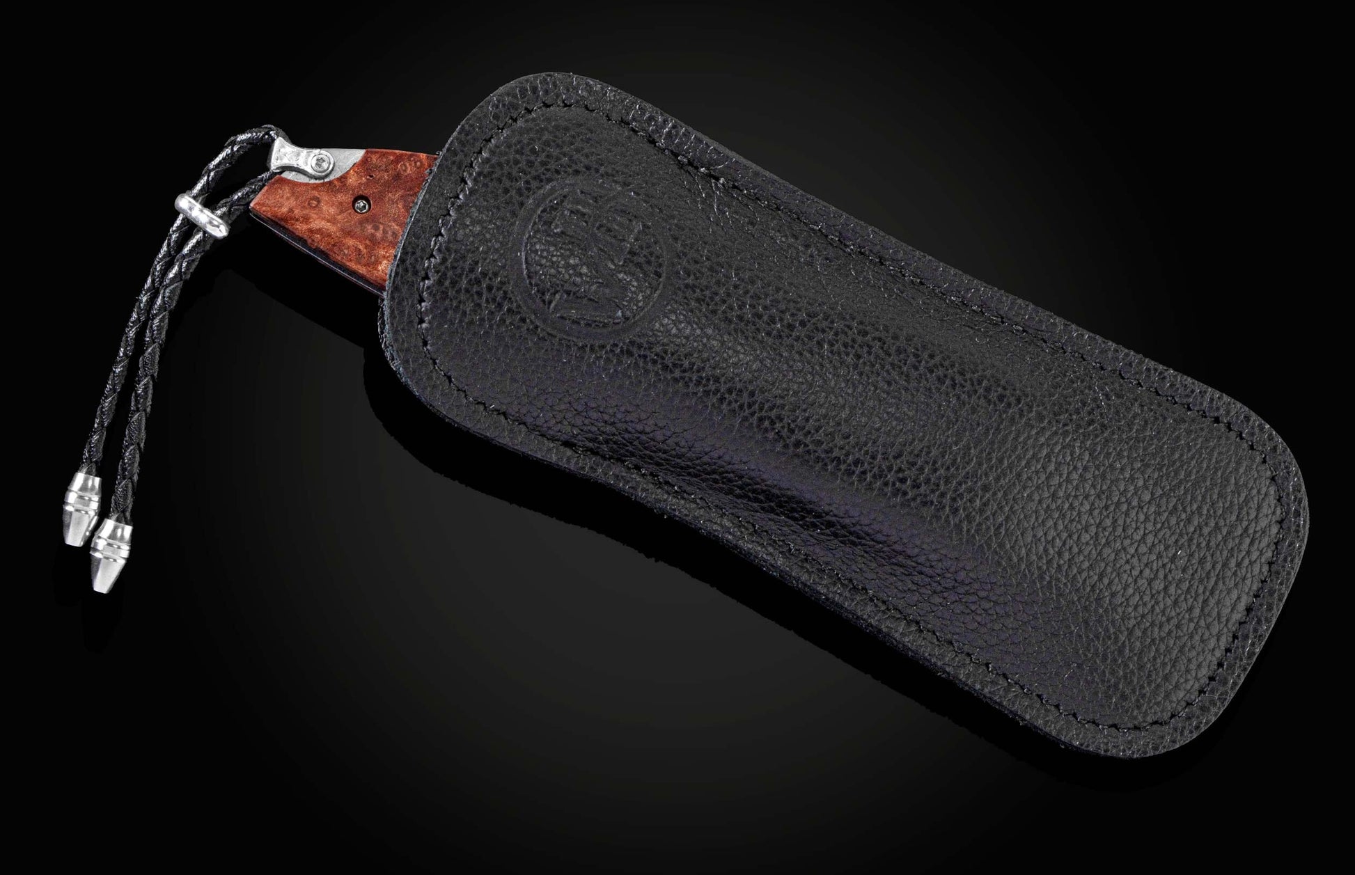 The Redwood Gold Pocket Knife with Redwood Burl Knife Handle in a leather case