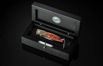 The Redwood Gold Pocket Knife with Redwood Burl Knife Handle in a case