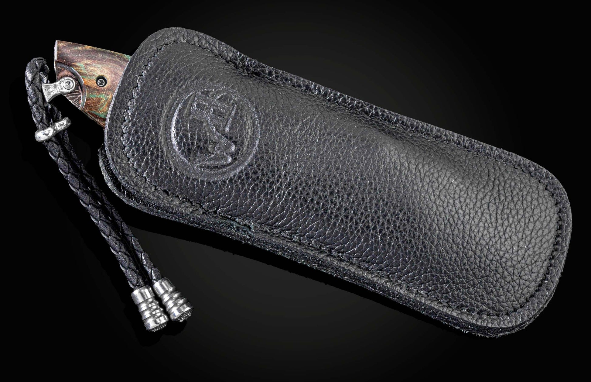 Handcrafted William Henry knife with hand-forged damascus steel frame by Chad Nichols