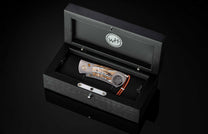 The Titanium Cigar Cutter with Fossil Mammoth Tooth and Damascus Blade in a case