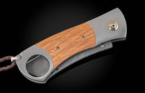 Custom William Henry cigar cutter with Pappy Van Winkle wood and damascus blade.
