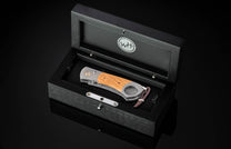 Custom William Henry cigar cutter with Pappy Van Winkle wood and damascus blade.