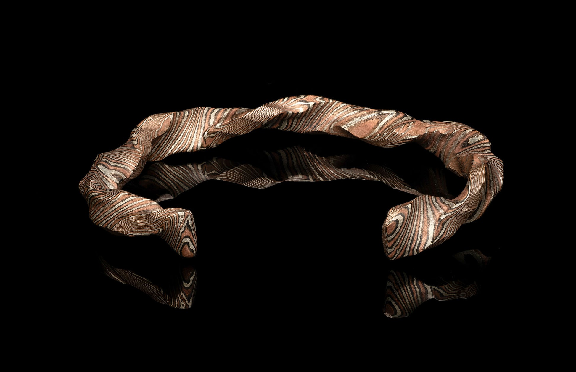 Twisted bracelet on a black background