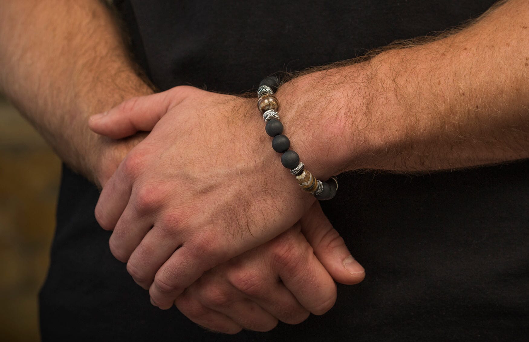 The Ice Age Beaded bracelet with Sterling Silver and Fossil Mammoth Tooth on a wrist
