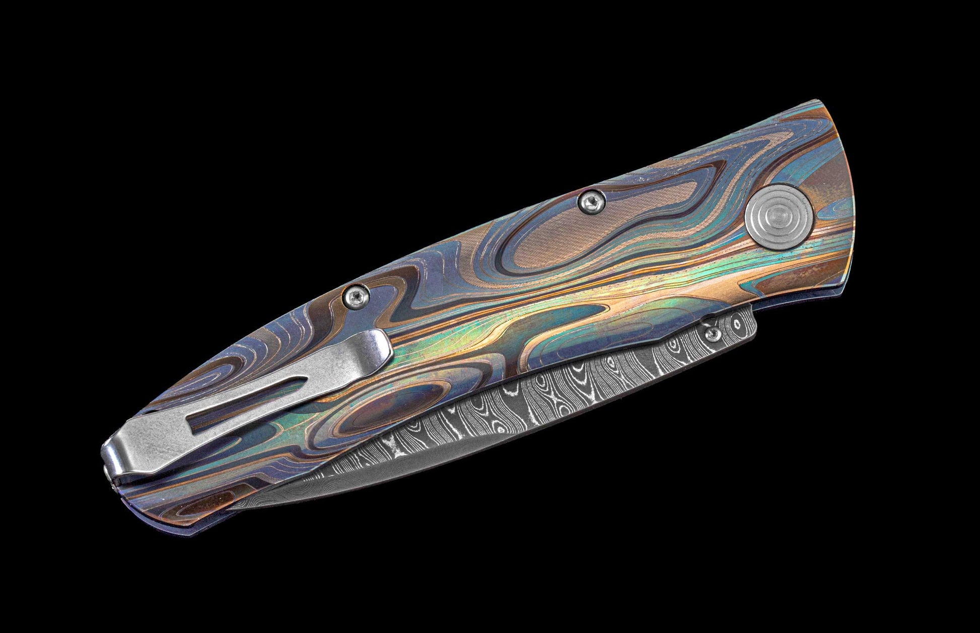 One of a kind William Henry knife with Laser color-engraved titanium frame and hand forged Damascus steel blade