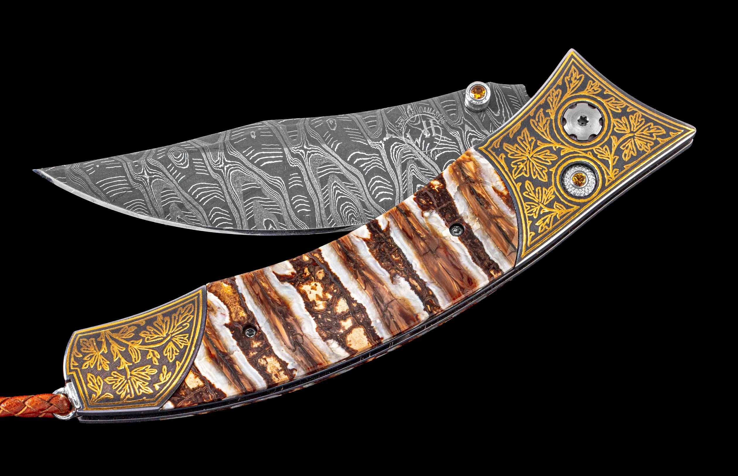 One of a Kind Custom Knife from William Henry featuring Fossil Mammoth tooth, citrine gemstones, 24K gold Koftgari inlay, and hand forged damascus steel blade
