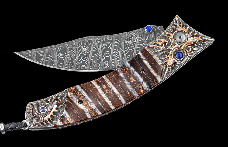 One of a Kind Custom William Henry Knife with a Hand-carved sterling silver & mokume frame set with Fossil Mammoth tooth, Lapis Lazuli gemstones, and a hand forged Damascus steel blade.