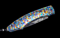 One of a kind William Henry custom knife with hand forged Damascus steel