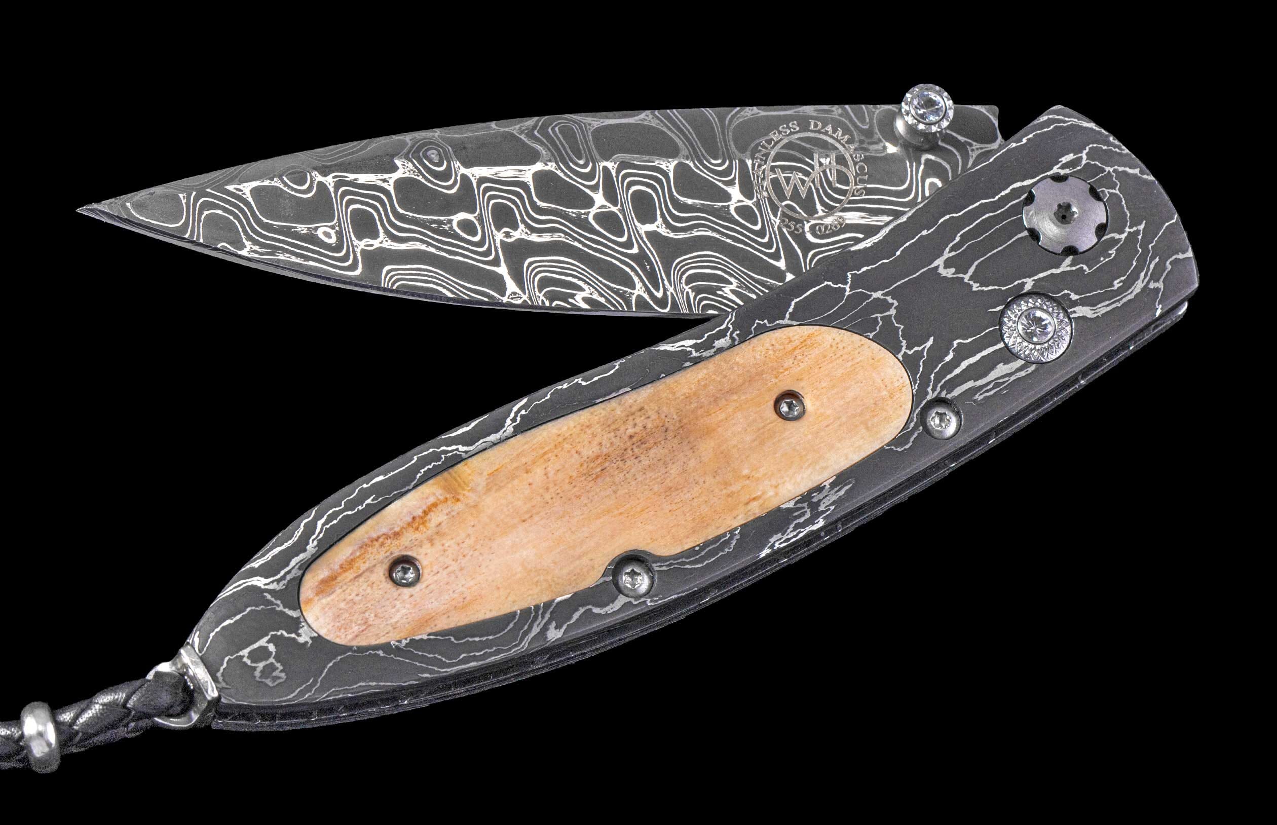 One of a Kind William Henry Custom Knife with damascus steel frame, Fossil walrus ivory scales, White topaz gems, and damascus steel blade.