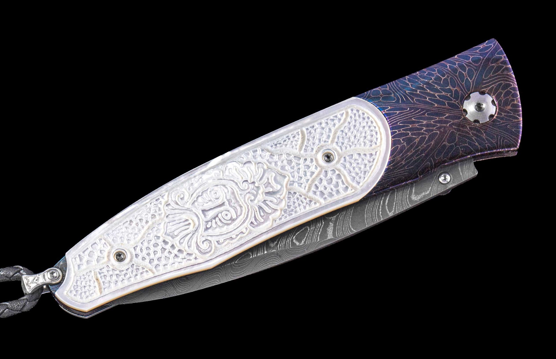 Folding knife with white carved handle, purple and bronze patterned frame, Damascus steel blade, and braided lanyard.