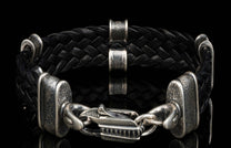 The black ‘Tilt’ leather bracelet from William Henry features widely woven kangaroo leather adorned with textured and patinated sterling silver details.