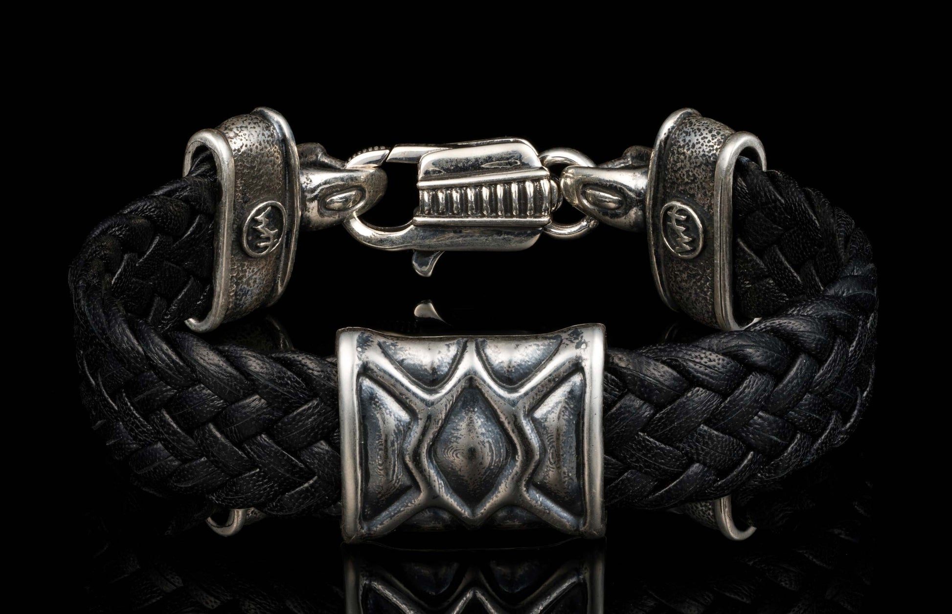 The ‘Rhomb’ leather bracelet from William Henry features woven kangaroo leather adorned with textured and patinated sterling silver details.