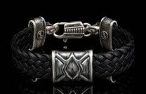 The ‘Rhomb’ leather bracelet from William Henry features woven kangaroo leather adorned with textured and patinated sterling silver details.