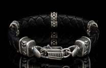 The black ‘Norn’ leather bracelet from William Henry features braided lambskin leather adorned with textured and patinated sterling silver details