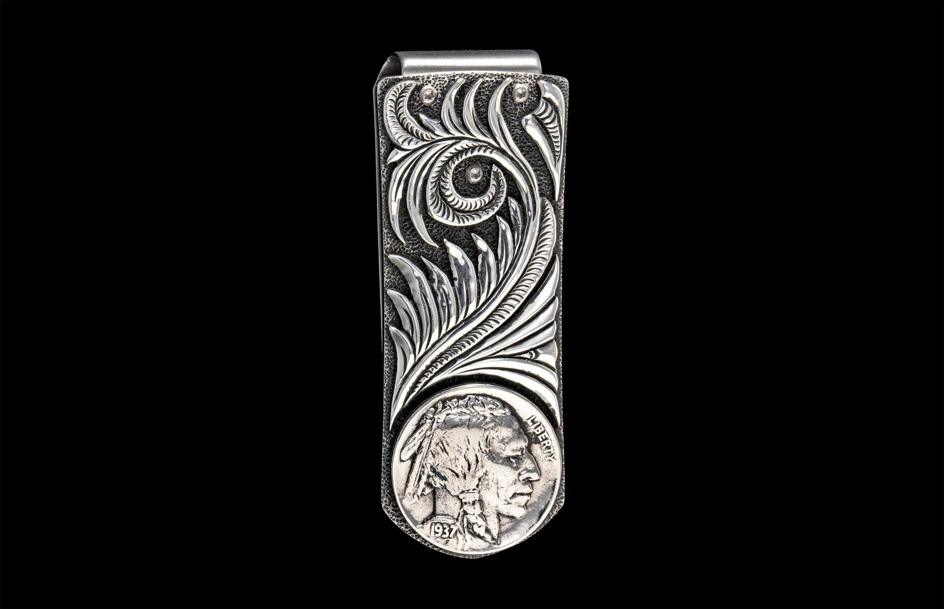 Handcrafted William Henry money clip featuring hand-carved sterling silver body with an inlaid Buffalo Nickel