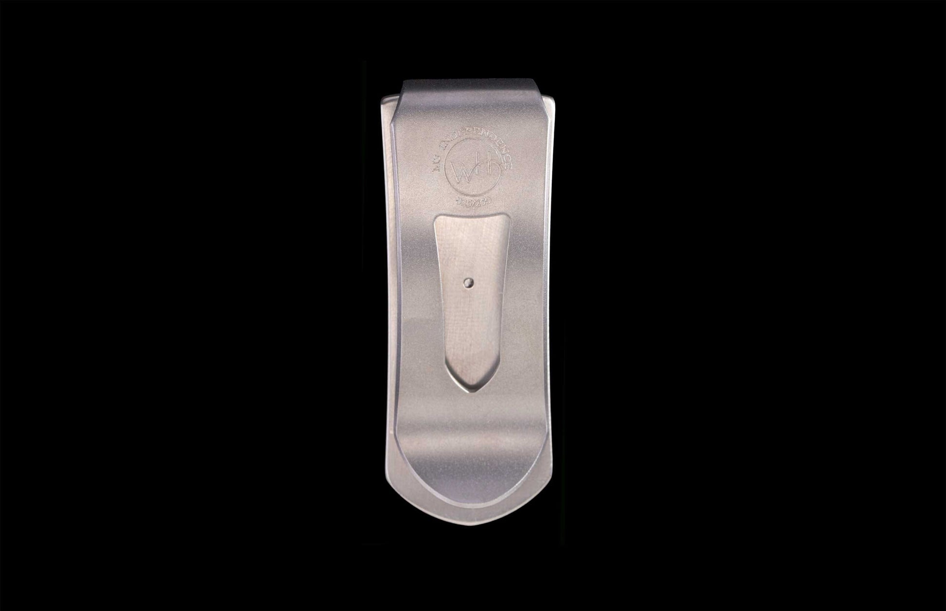 Handcrafted money clip from William Henry featuring  eagle heads in hand-carved sterling silver inlaid with wood from the original beams of Independence Hall. 