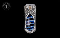 Textured silver money clip with a golden skull, sunburst design, and blue, black, and white striped inlay.