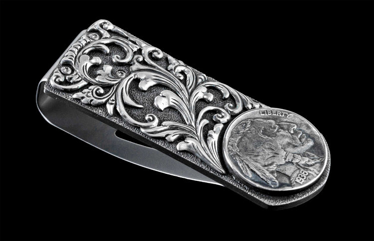 Handcrafted money clip from William Henry features hand-carved sterling silver body with an inlaid Buffalo Nickel, and finished with a beautiful patina.