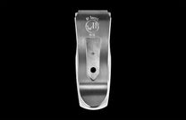 Handcrafted Money Clip from William Henry featuring hand-carved sterling silver inlaid with fossil Woolly Mammoth bone. The clip is machined and blast-polished from tempered stainless steel