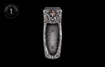 Ornate silver-toned money clip with a prominent copper star, intricate scrollwork, and textured metal finish.