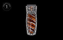 Money clip with a skull motif and brown striped inlay, featuring silver-toned metal with intricate scrollwork.