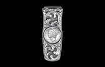 Handcrafted money clip from William Henry is hand-carved sterling silver by Lee Downey