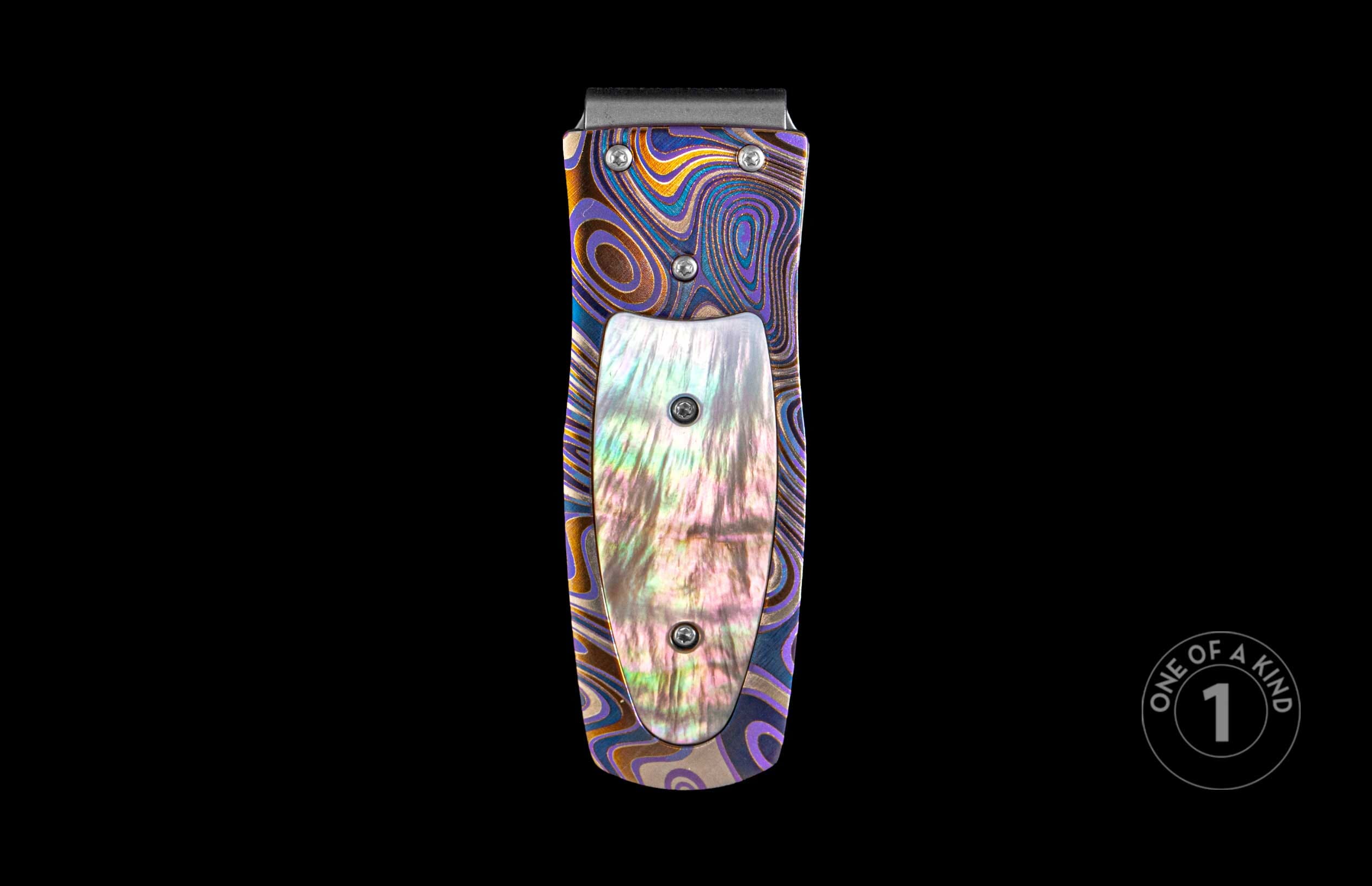 Handcrafted William Henry money clip with Laser color-engraved titanium and Black Lip pearl