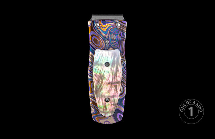 Handcrafted William Henry money clip with Laser color-engraved titanium and Black Lip pearl