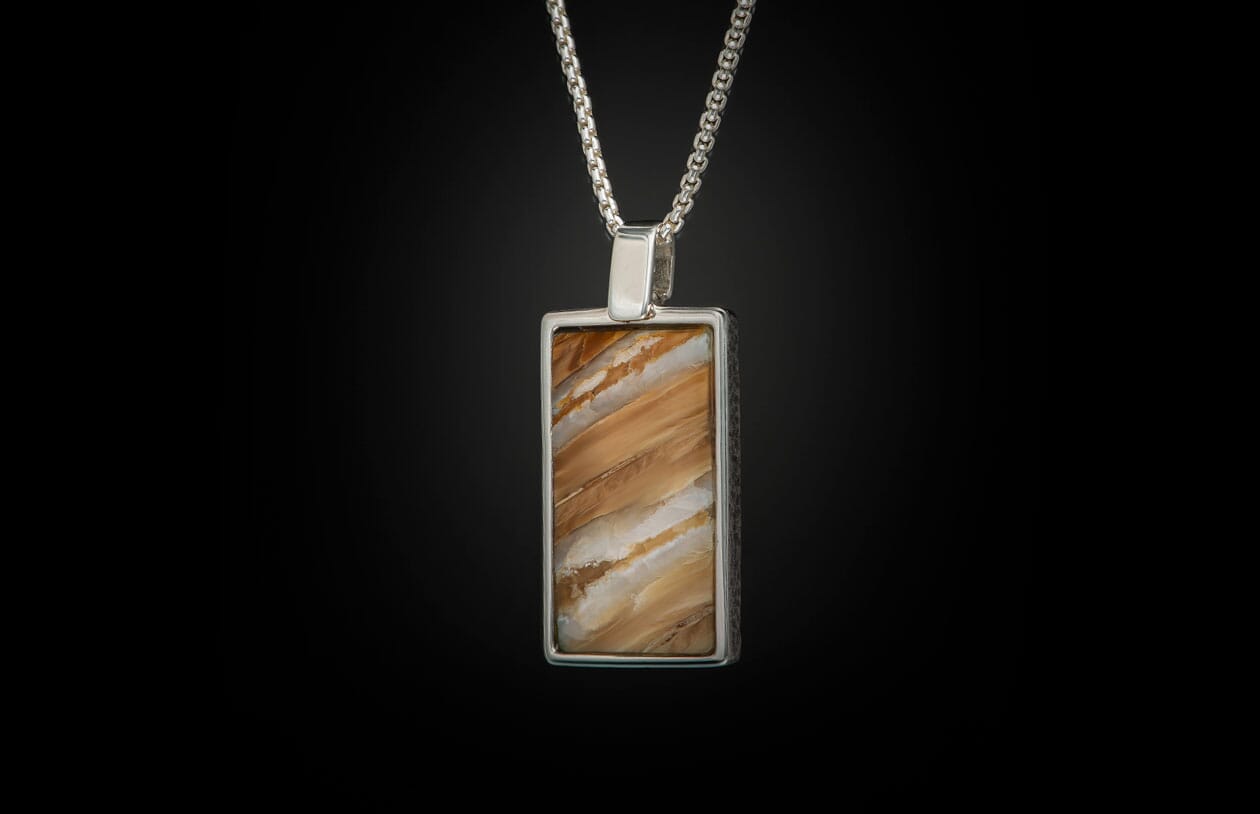 The Mammoth Shift Sterling Silver Pendant Inlaid with Fossil Mammoth Tooth