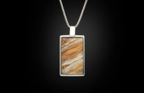 The Mammoth Shift Sterling Silver Pendant Inlaid with Fossil Mammoth Tooth