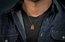 The Mammoth Shift Sterling Silver Pendant Inlaid with Fossil Mammoth Tooth