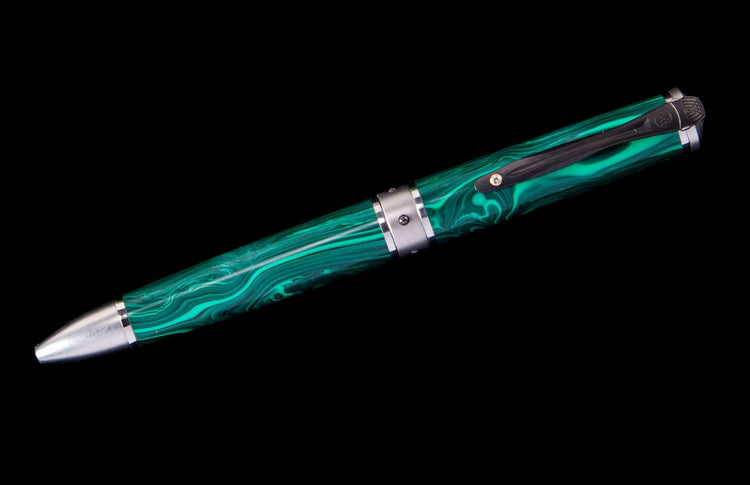 Green malachite pattern pen with silver accents and a clip, angled on a black background.