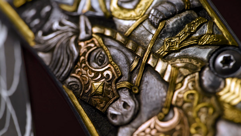 video of elaborate hand engraved William Henry knife depicting medieval knights and dragon