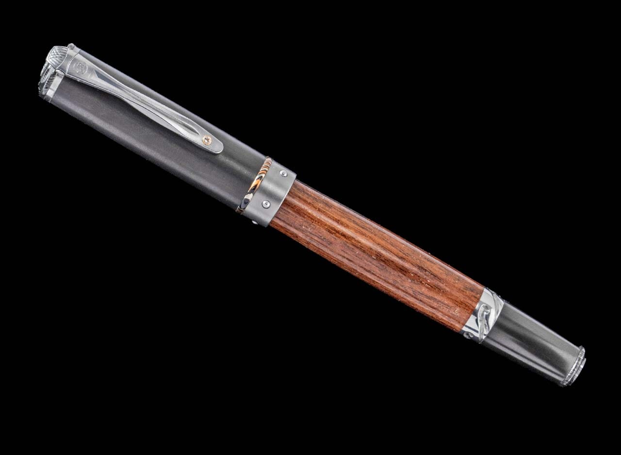Handcrafted William Henry pen featuring a barrel of cherry wood from Churchill Downs Turf Club