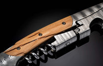 Handcrafted William Henry Corkscrew is a double hinged sommelier’s tool featuring a Damascus steel frame