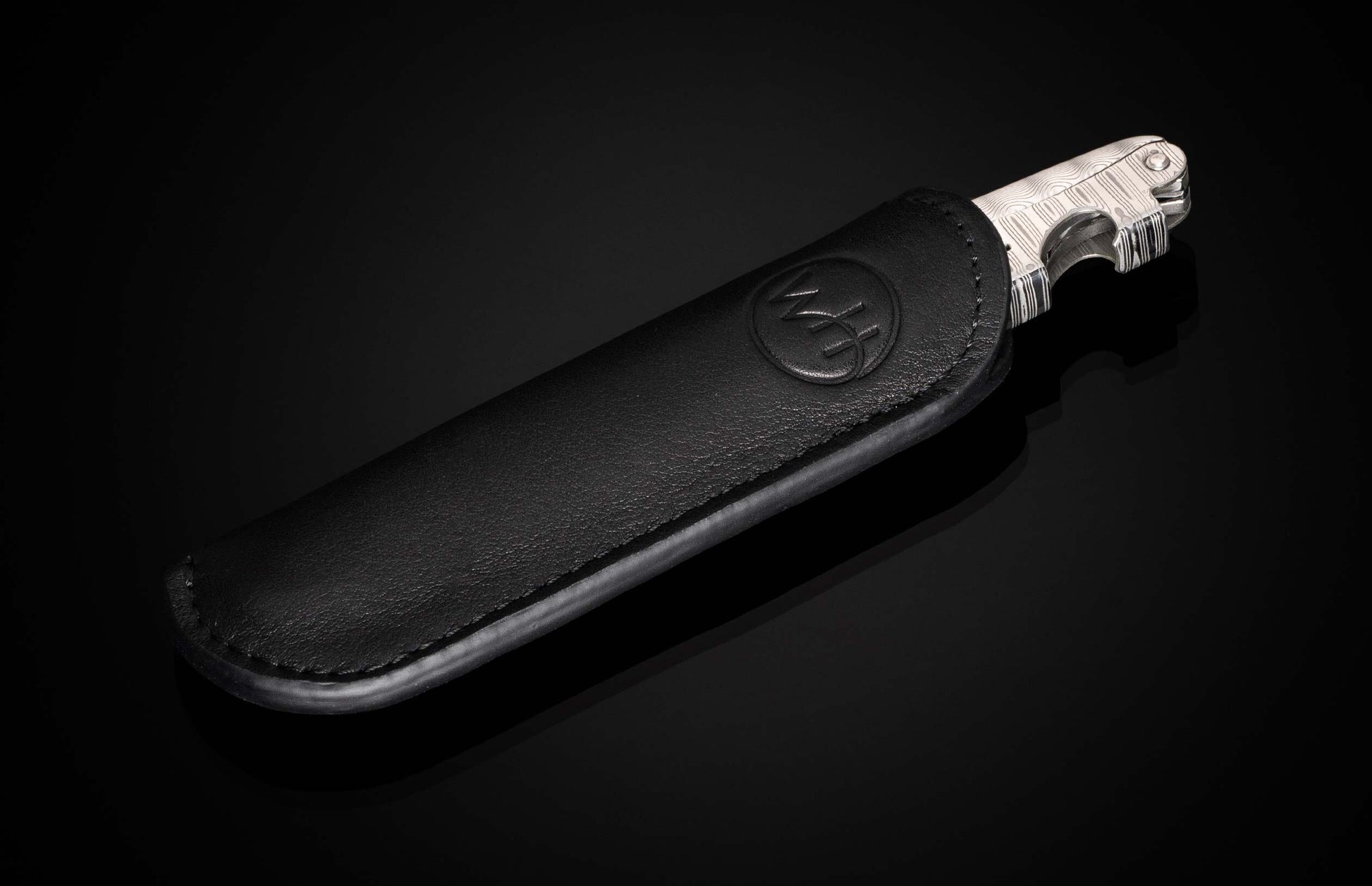 The Gris (S23 WP) Wine Opening Tool & Corkscrew in a leather case