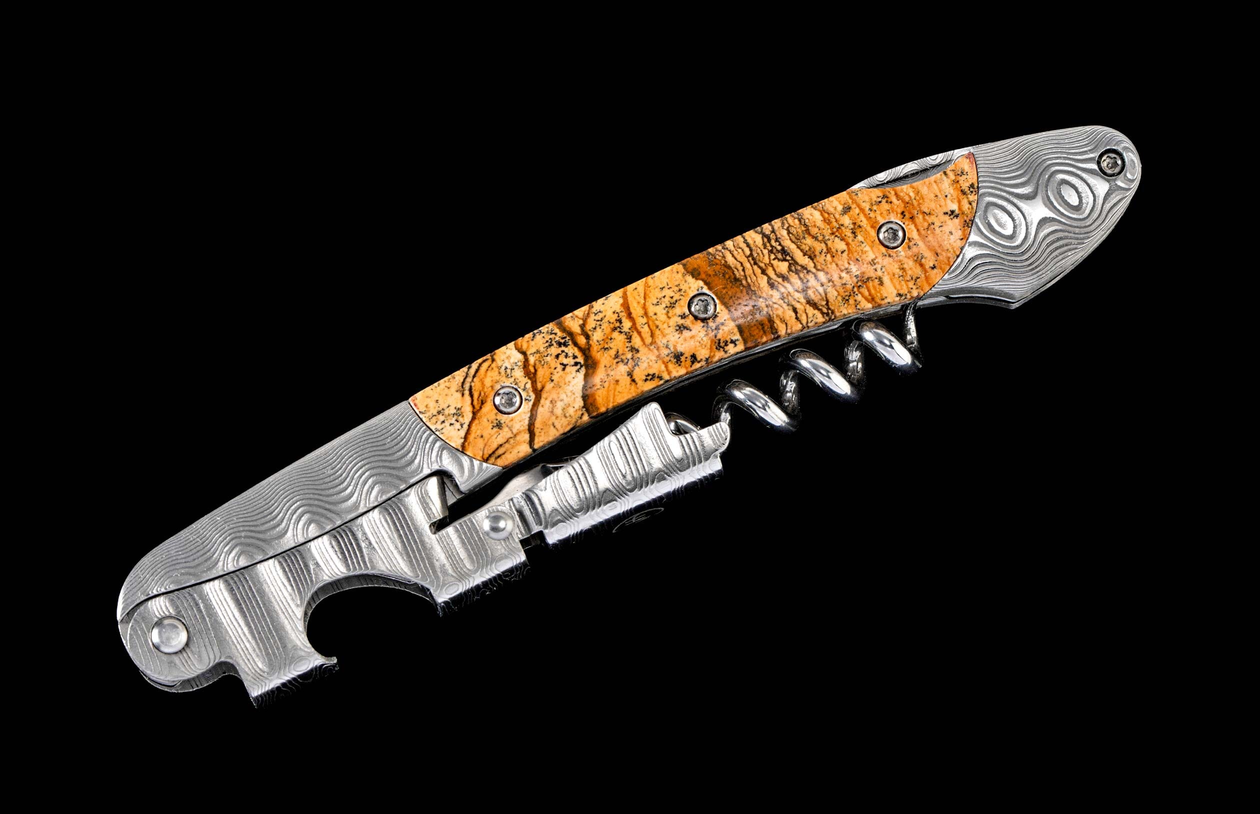 Orange-tan patterned handle waiter's friend corkscrew with Damascus steel body, foil cutter, and bottle opener.