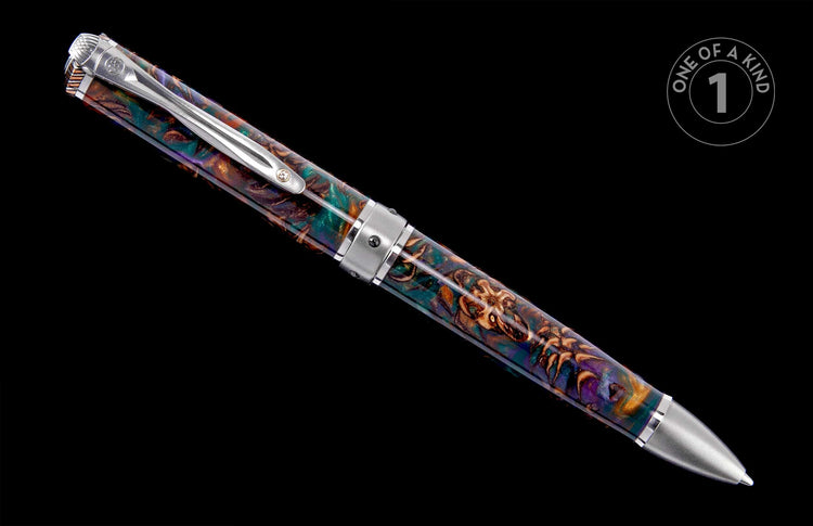 Multi-colored pen featuring a swirling teal, purple, and gold pattern, silver-toned accents, and a 'One of a Kind' graphic.