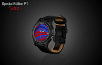 Special Edition Fordite watch by William Henry with red and blue marbled dial, black leather strap, side view on dark background