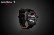 Special Edition Fordite watch by William Henry with marbled red, white, and black dial, black case, and leather strap, side view