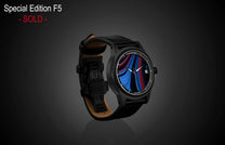Special Edition Fordite watch by William Henry with blue and red marbled dial, black PVD case, and black leather strap, side view