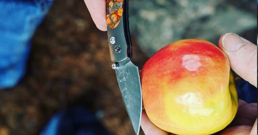 Cutting Apple With Knife