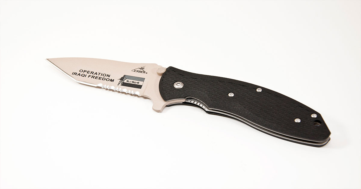 Black knife on white background