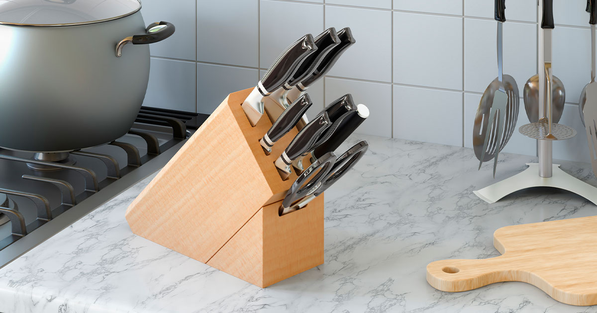Set of kitchen knives on counter
