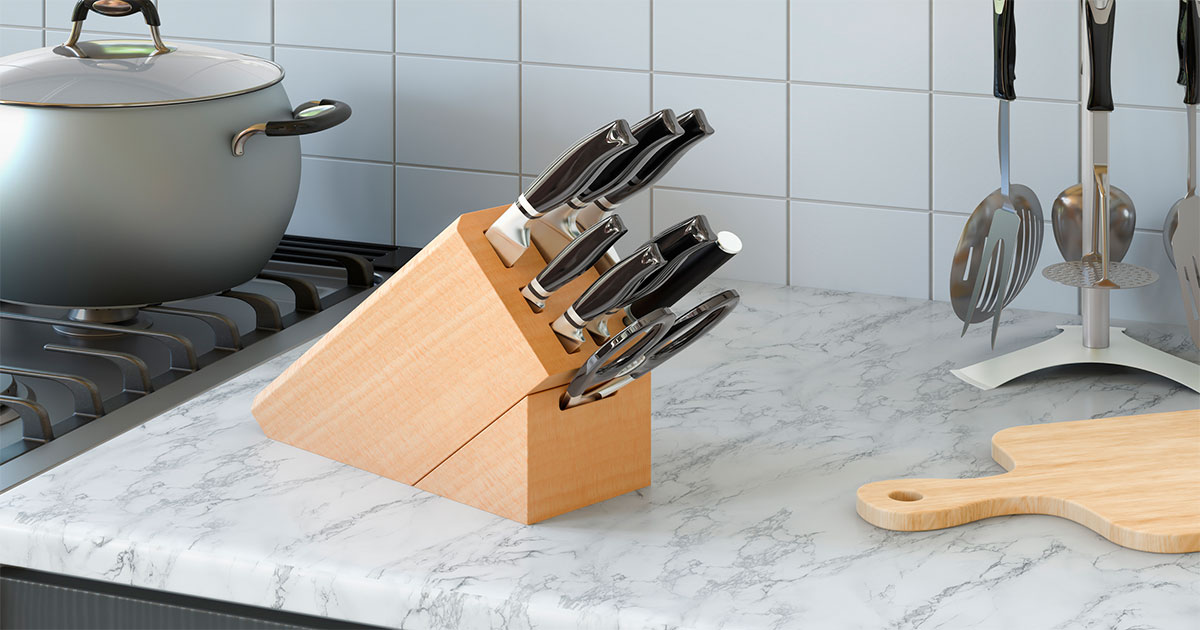 Set of kitchen knives on counter
