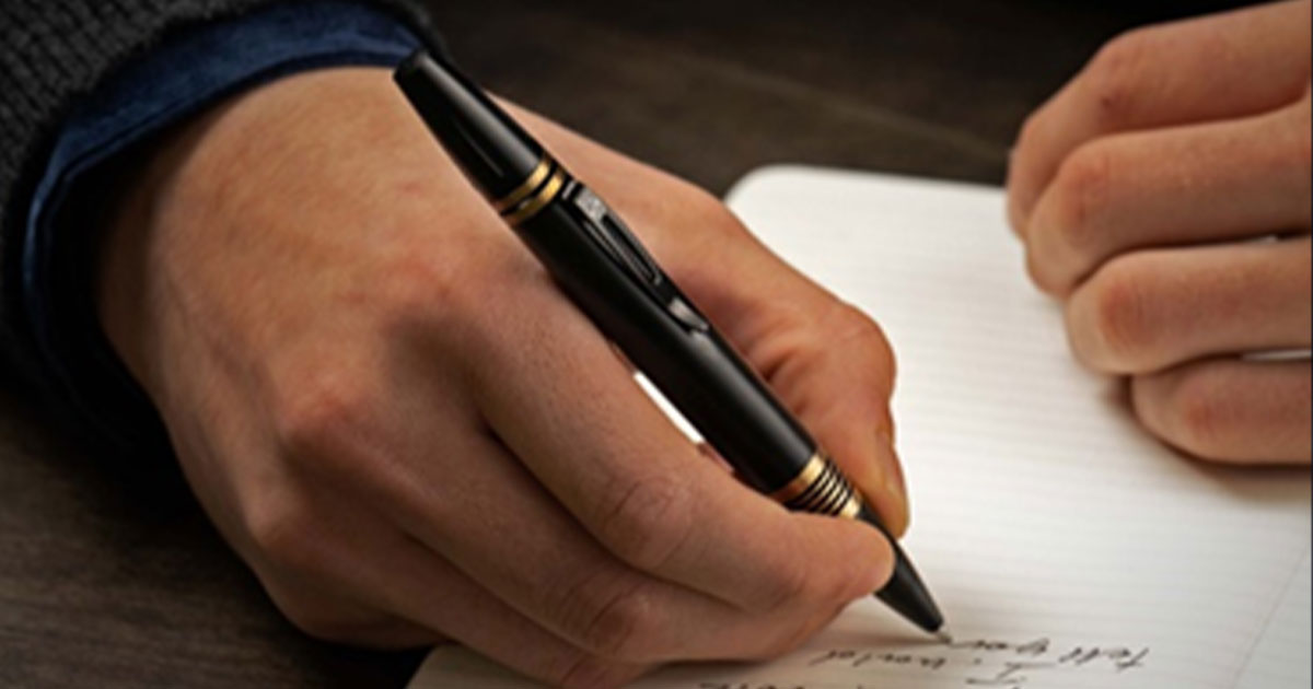 Man writing with nice fountain pen